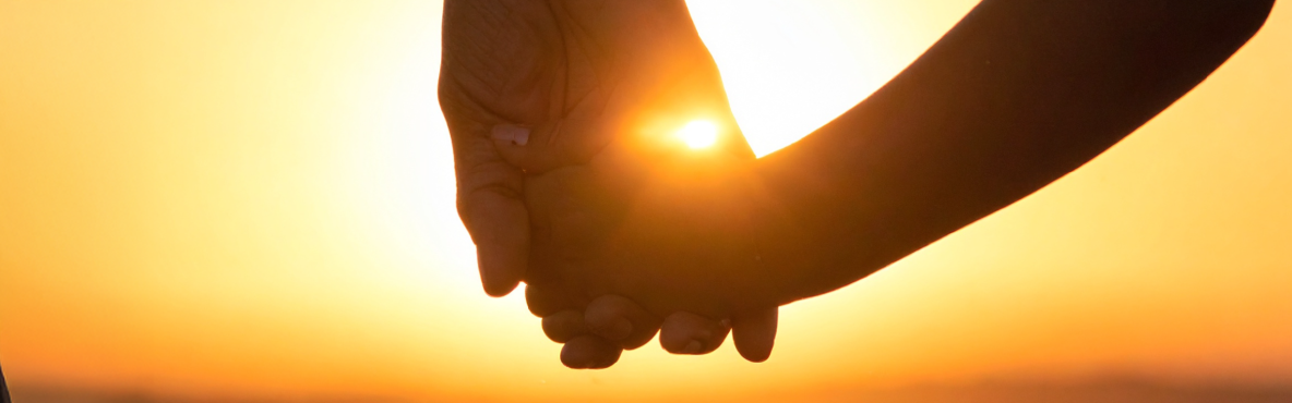 Hands holding sunset_GMC